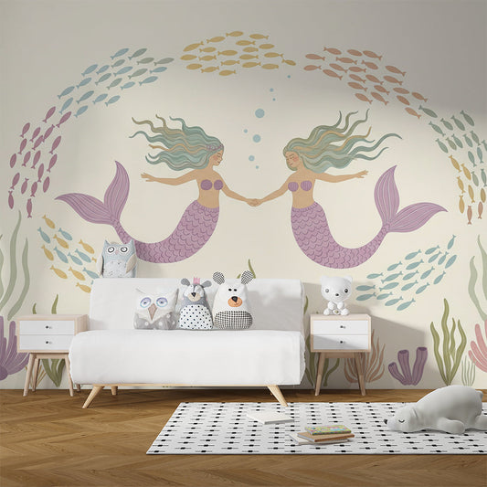 Kids-Mundo mermaid wall mural covering a kids bedroom wall behind a bed and cushions