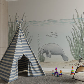 Marine life wallpaper featuring gentle manatee in aquatic-themed children's playroom by Kids-Mundo