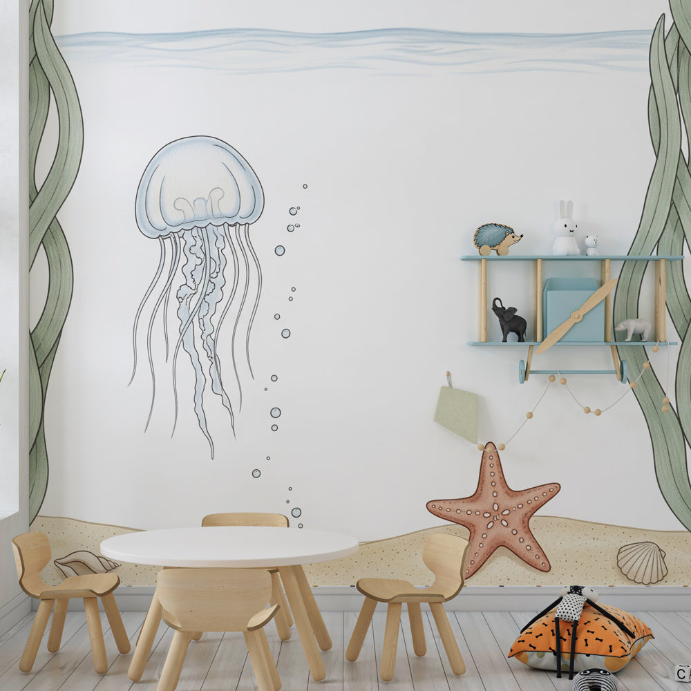 Ocean themed mural wallpaper creating calming underwater nursery decor with jellyfish and starfish