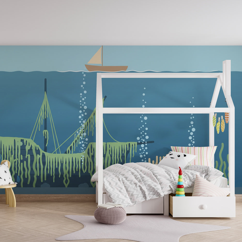 Marine themed mural wallpaper for children's playroom with shipwreck and coral design