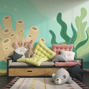 Ocean themed mural wallpaper creating calming underwater atmosphere in children's bedroom