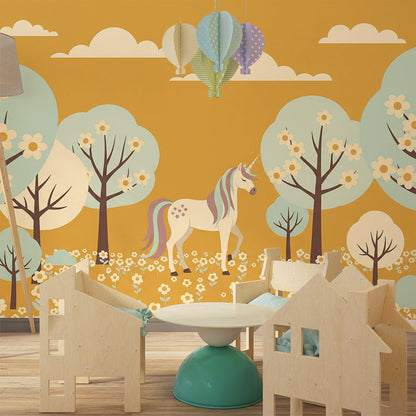 Kids-Mundo unicorn orchard mural on a kids' bedroom wall, blossom trees under a golden sky