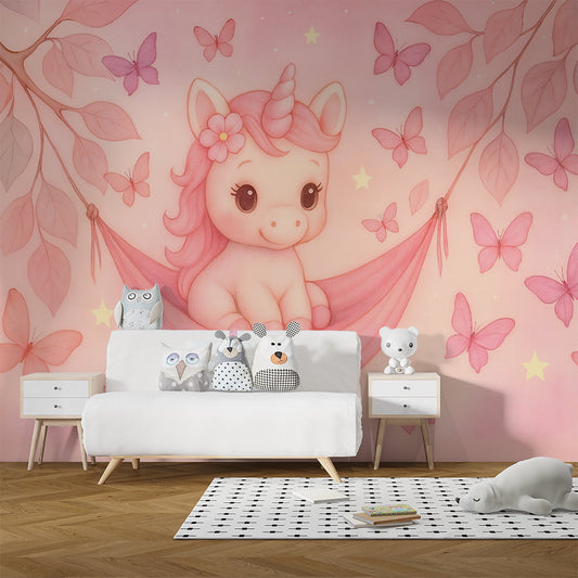 Kids-Mundo unicorn and butterfly wall mural in a girl's pastel pink kids bedroom with fairy lights.