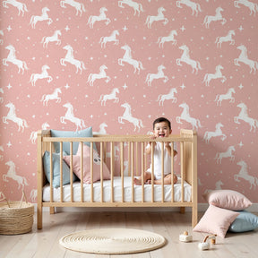 White unicorns on pink mural wallpaper in modern girls bedroom by Kids-Mundo