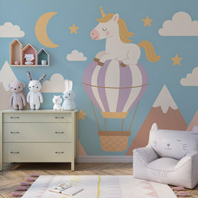 Fantasy unicorn mural wallpaper creating dreamy atmosphere in kids playroom space
