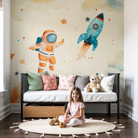 Kids-Mundo watercolour astronaut and rocket wall mural above a cot in a cream nursery.