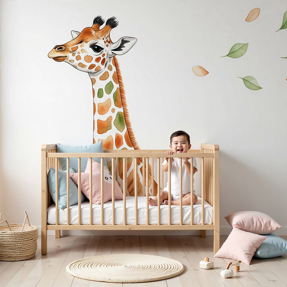 Kids-Mundo baby giraffe watercolour wall mural brightening a gentle playroom corner