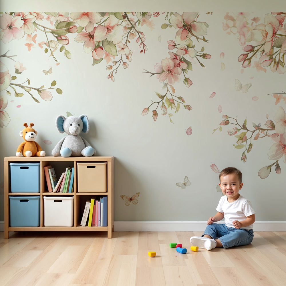 Kids-Mundo watercolour cherry blossom wall mural styled in a soft nursery room