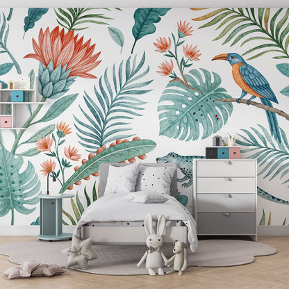Kids-Mundo tropical watercolour wall mural featuring leaves and a lizard in a bright playroom