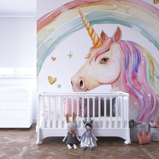 Kids-Mundo unicorn rainbow wall mural behind a bed in a girls bedroom with pink accents