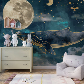 Whale and moon mural wallpaper transforming toddler room into magical ocean sanctuary