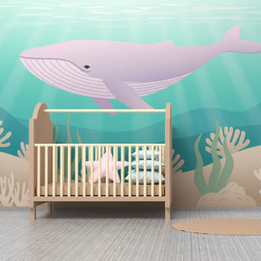 Marine whale wallpaper complementing natural wood furniture in peaceful kids room by Kids-Mundo