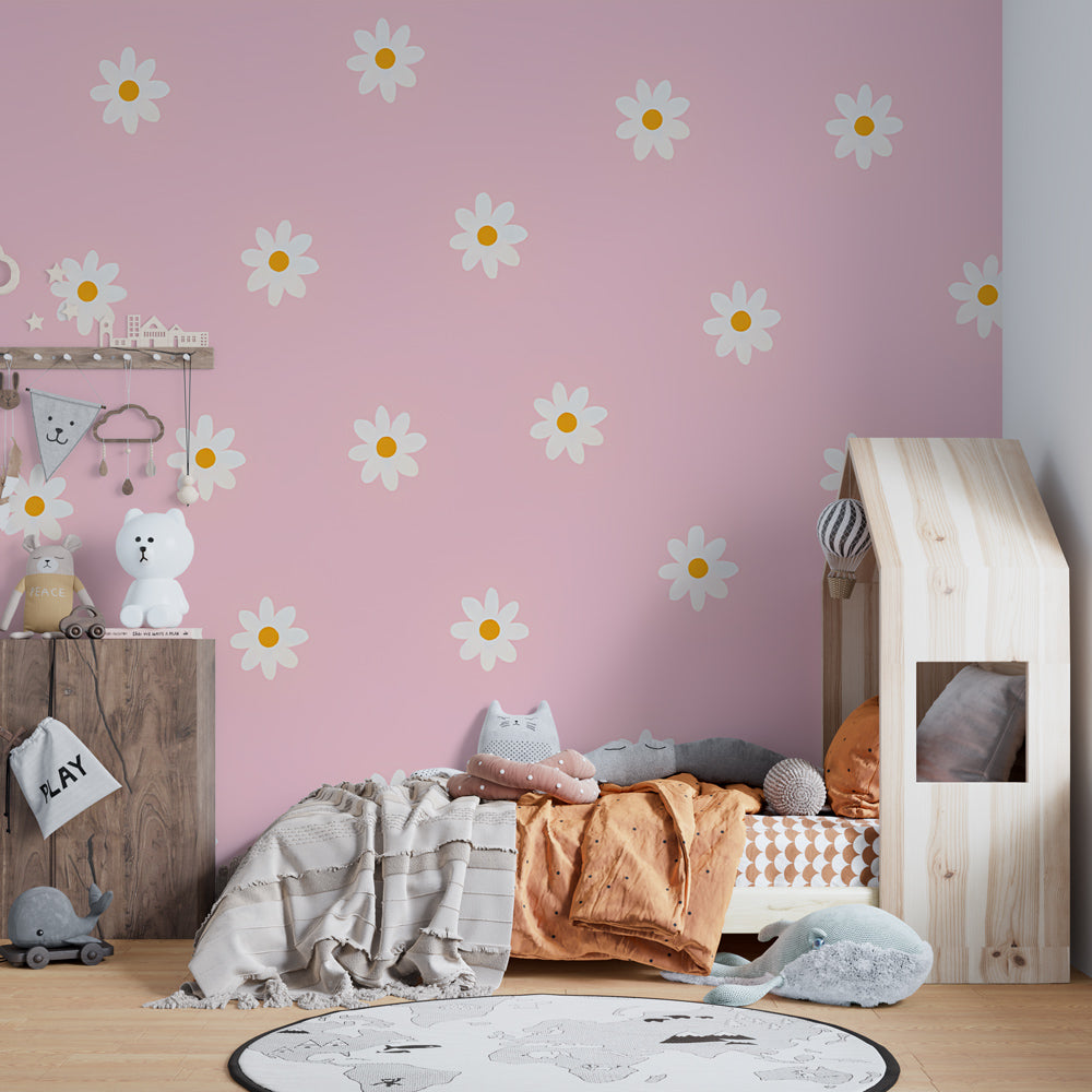 Pink daisy wallpaper transforming bright kids playroom into garden sanctuary by Kids-Mundo