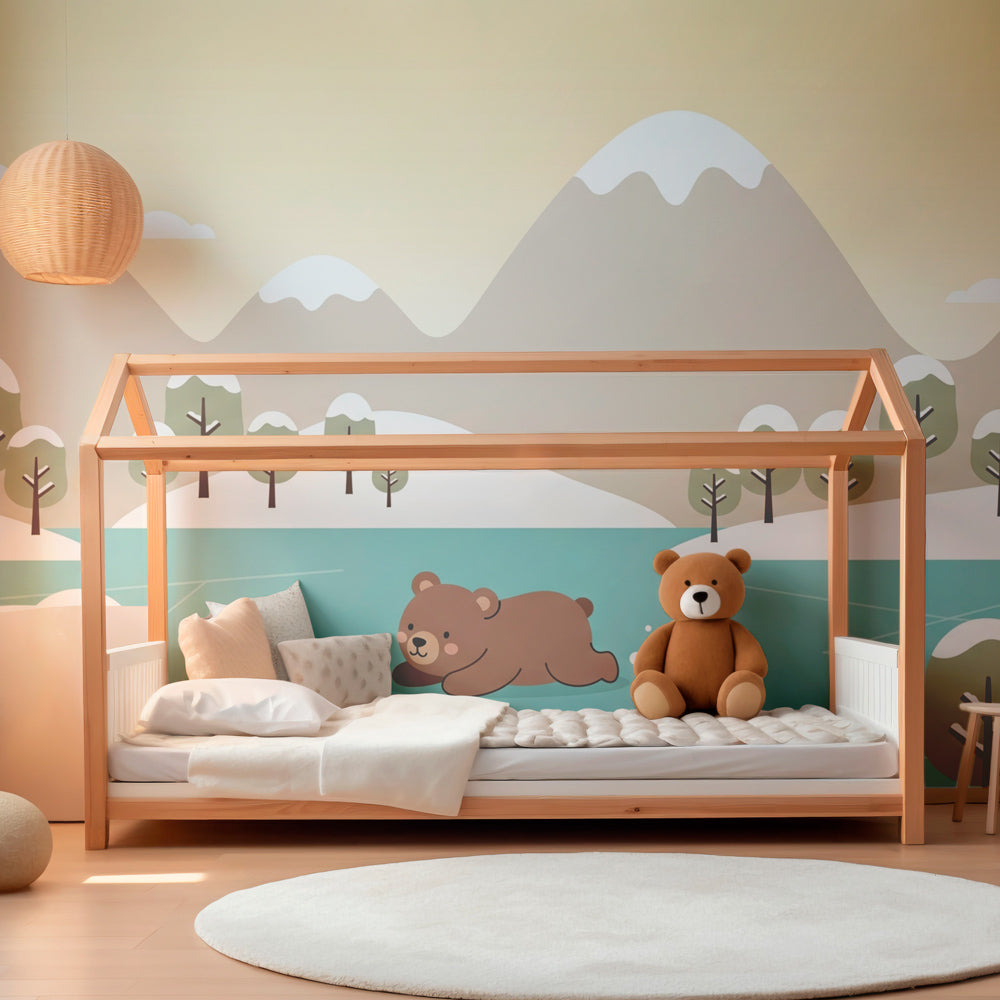 Adorable bear wallpaper with snowy mountains decorating peaceful baby room setting