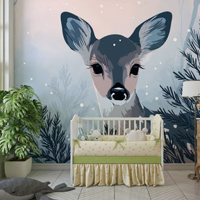 Pastel blue winter deer mural wallpaper with snow-covered trees for nursery decor