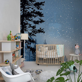Enchanted snowy forest wallpaper creating magical winter atmosphere in children's bedroom