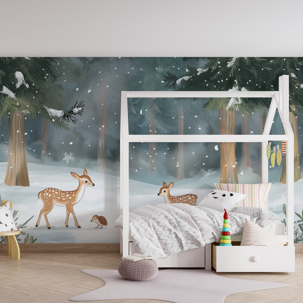 Snowy forest mural wallpaper for children's room featuring gentle fawns and pine trees