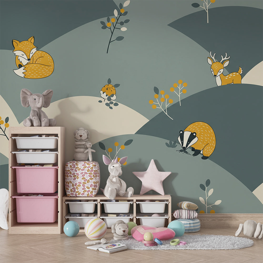Kids-Mundo woodland animal wall mural behind a bed in a cosy green-grey kids bedroom.