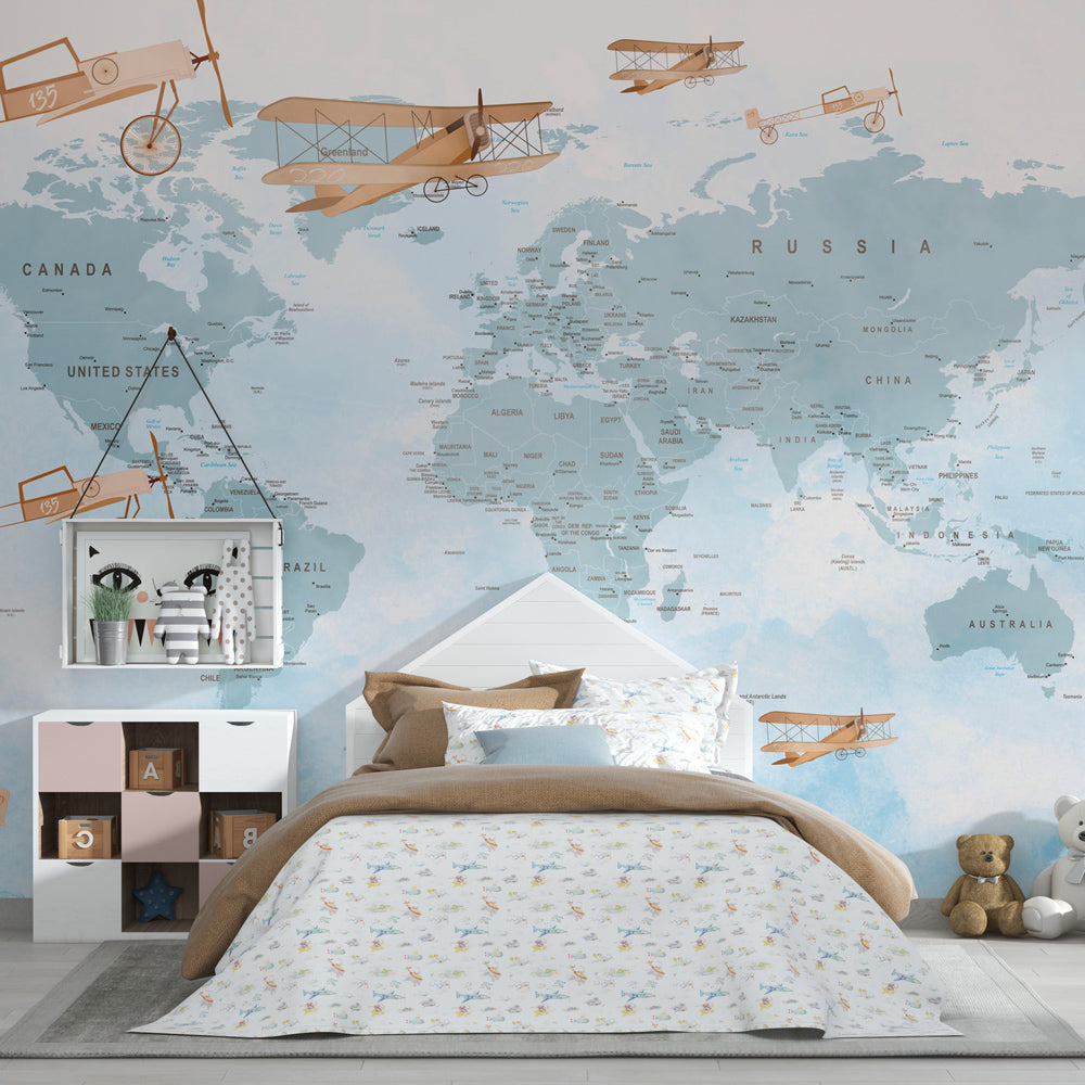 Blue world map wallpaper with retro airplanes inspiring adventure in kids playroom decor