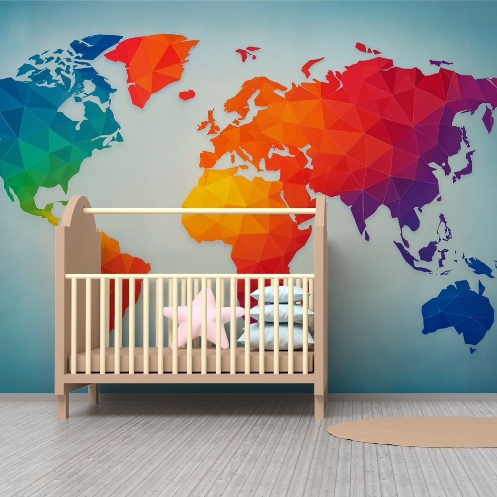 Colorful geometric world map wallpaper creating educational nursery wall decor with vibrant continent patterns