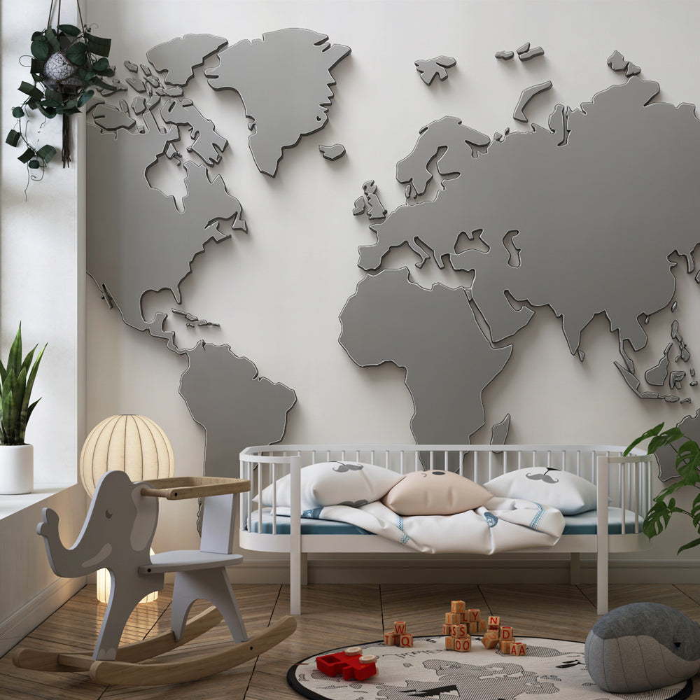 Elegant world map wallpaper creating sophisticated nursery decor with metal-inspired gray tones
