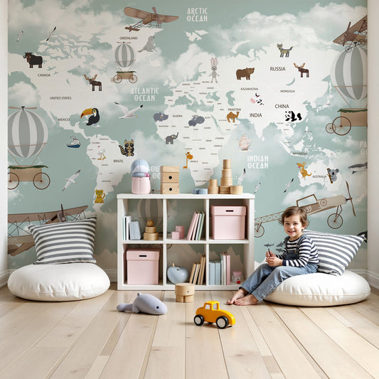 World map mural wallpaper with animals and balloons in modern nursery by Kids-Mundo