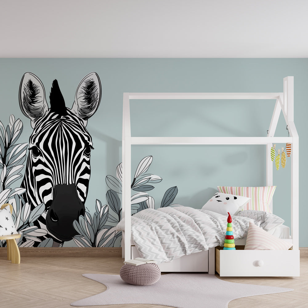 Elegant zebra head mural wallpaper for kids playroom with natural foliage accents by Kids-Mundo